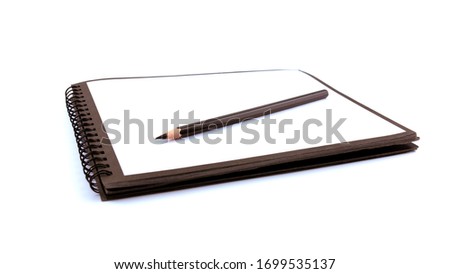 pencil and notebook on a white background isolate
