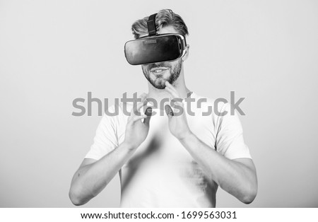 Working on Programing. Testing new technologies. virtual reality goggles. Modern business and education. man wear wireless VR glasses headset. man use modern technology. Digital future and innovation.