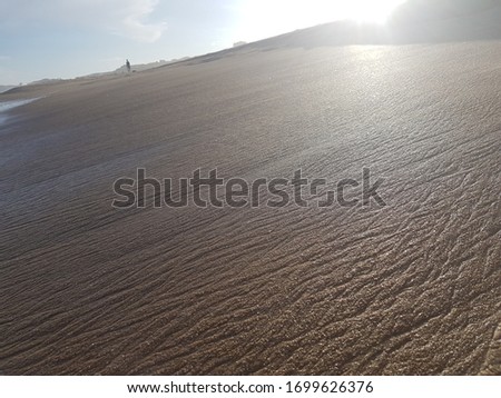 Beautiful summer beach. White sands and strong winds make this the perfect destination for a holiday. The beaches remain relatively empty and trash free making for a beautiful and elegant landscape.