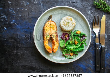 pink salmon steak fried and salad,
grilled seafood, pescatarian Menu concept food background keto or paleo diet. top view. copy space for text Royalty-Free Stock Photo #1699637857