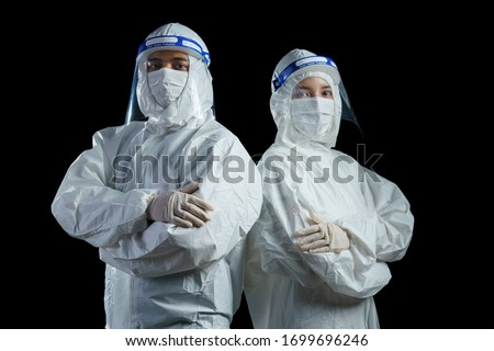 Doctor wearing ppe suit and face mask and face shield in hospital, Corona virus, Covid-19 virus outbreak concept. Royalty-Free Stock Photo #1699696246