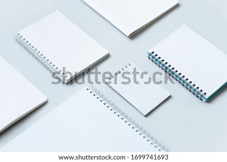 business training concept. notebooks on a blue background close up ruler and stationery