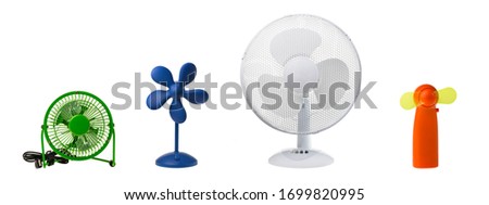 Four table fans (blue, green, white and orange) isolated on white background