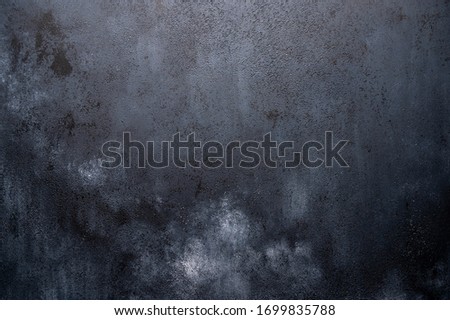 Dark background made of wood with imitation of light chalk stains for design