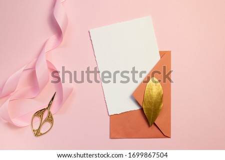 Mockup card with pink ribbon, envelope, shadows on a pink background. For wedding invitations, greetings, birthdays.