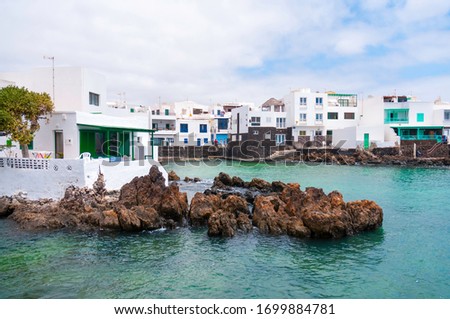 Lanzarote turquoise water and white houses background. Canary Islands. Spain 
