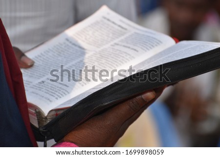 Indian language Bible reading closeup  Royalty-Free Stock Photo #1699898059