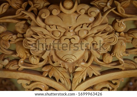  A wooden scluptured dragon which signifies the rain and thunder in Buddhism