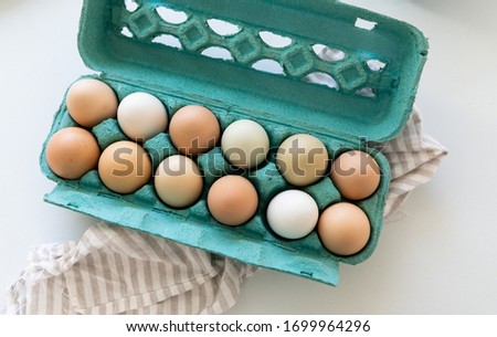 Dozen of Free Range Chicken Eggs Royalty-Free Stock Photo #1699964296