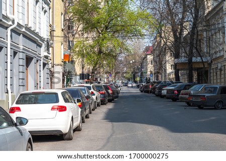 parked cars in the city center on a one-way street