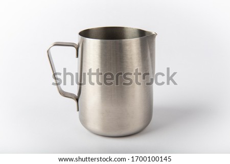 Espresso milk frothing pitcher side view