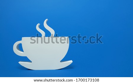 The cafe is open after quarantine. White plate inviting sign for cafe on a blue background