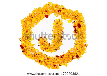 Letter J In Spring Flower Petal Hexagon. Marigold petal alphabet isolated on white background. Beautiful Flower petal character concept