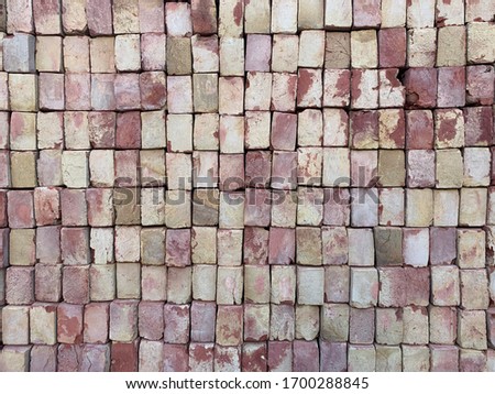 Faded colored bricks stacked in a store
