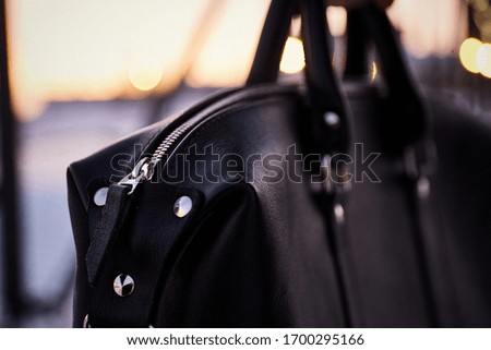 
A leather product photographed at sunset day.