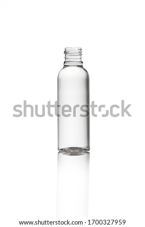Uncapped transparent plastic water bottle. black and white. Isolated white background for design mockup. Cosmetic Royalty-Free Stock Photo #1700327959