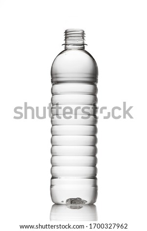 Uncapped transparent plastic water bottle. black and white. Isolated white background for design mockup Royalty-Free Stock Photo #1700327962