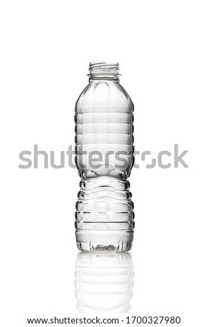 Small uncapped transparent plastic water bottle. black and white. Isolated white background for design mockup eight ounces Royalty-Free Stock Photo #1700327980