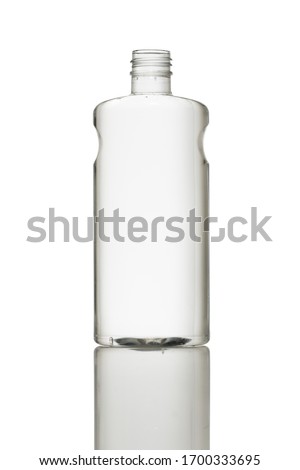 Transparent empty lotion bottle. Clear cosmetic container jar isolated white background for label design no cap open with reflection Royalty-Free Stock Photo #1700333695