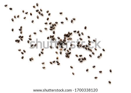 Chia seeds scattered over white background, top view Royalty-Free Stock Photo #1700338120