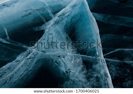 Beautiful blue ice of lake Baikal, Listvyanka village