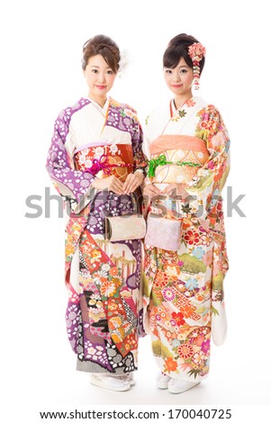 attractive asian women wearing traditional japanese kimono on white background