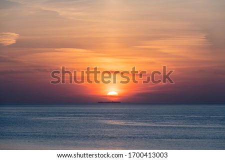 Beautiful sunsets on the North Sea Royalty-Free Stock Photo #1700413003