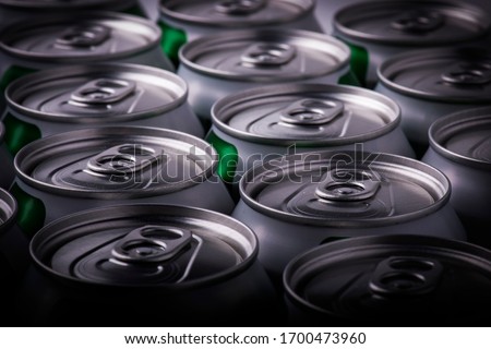 Close up aluminum drink can on a dark background, side view. Beer can or soft drink.