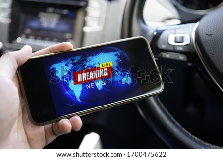 Breaking news live with worlmap background on Smartphone screen