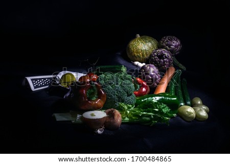 Ingredients of a vegetable soup photographed with a light painting technique