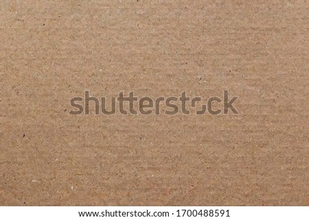 Light brown wrapping paper texture. Beige parchment. Old cardboard background. Design element. Copy space.