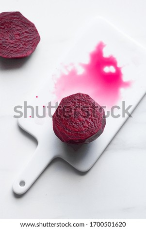  beet root on white marble background