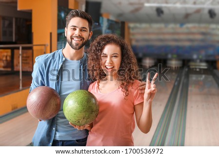 Friends spending time in bowling club