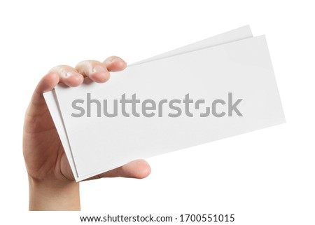 Two empty paper sheets in hand, isolated on white background