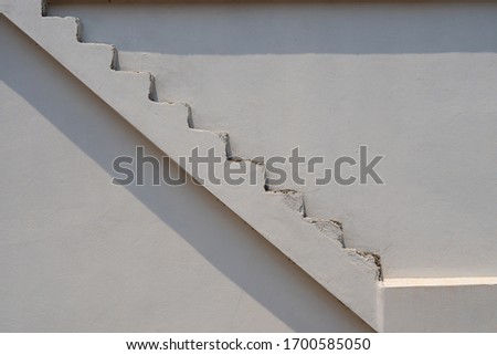 concept of success by walking up the stairs 