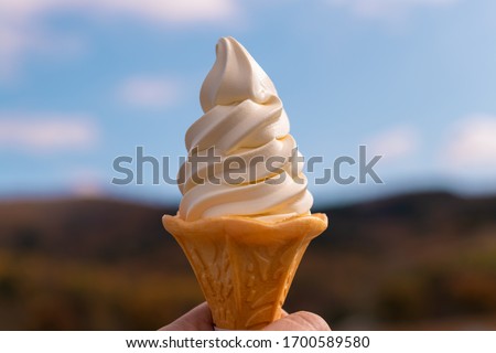 Japan Icecream soft serve vanilla with blurry background Royalty-Free Stock Photo #1700589580