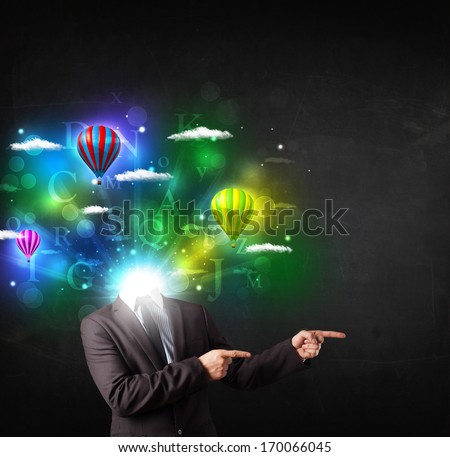 Man in suit with glowing dreamy cloudscape concept