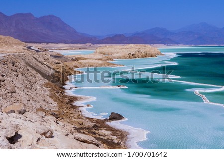 Salty Coastline of the Blue Lake Assal, Djibouti Royalty-Free Stock Photo #1700701642