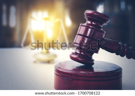 Legal and law concept with judge gavel and scales of justice background