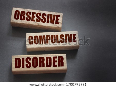 Obsessive Compulsive Disorder words on wooden blocks. Psychiatry psychological problem concept, OCD.