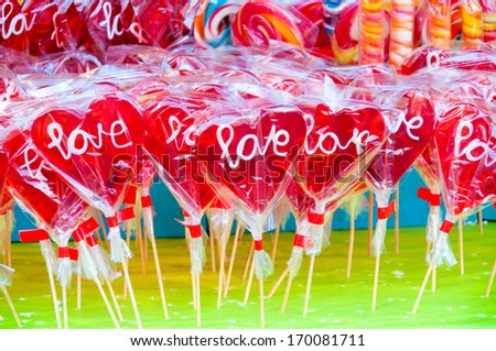Selective focus on the front heart shape lolly pop