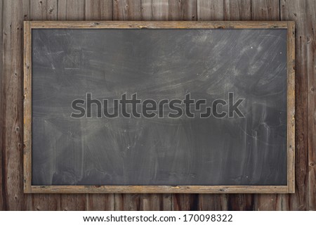 Wooden texture background, blackboard ( chalkboard ) texture. Empty blank black chalkboard with chalk traces Royalty-Free Stock Photo #170098322