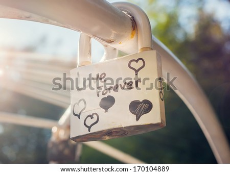 Love forever padlock with lens flare effect