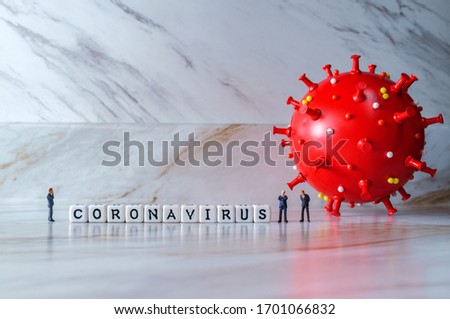 Businessmen ignore social distancing while standing in the presence of the deadly coronavirus Royalty-Free Stock Photo #1701066832