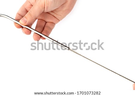 Reusable Metal Straws with Portable Case - Stainless Steel, Eco-Friendly Drinking Straw Set with  Cleaning Brushes. Stainless Steel Metal Straws, Reusable metal straws on a white isolated background,  Royalty-Free Stock Photo #1701073282
