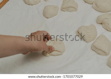 Muslim woman in isolation making bread for meal during holy month Ramadan and during Covid 19 pandemia