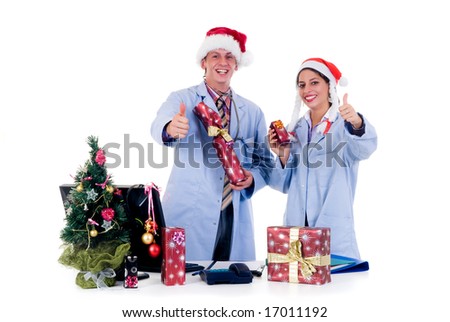 Christmas, medical team, two young male and female cardiologist in the office.  Studio, white background.