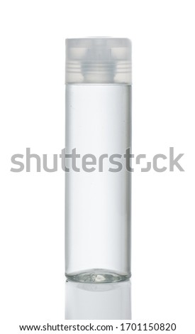 Transparent plastic bottle with clear cap. Isolated white background for design mockup square top bevel Royalty-Free Stock Photo #1701150820
