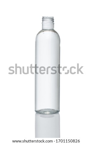 Uncapped transparent plastic bottle. Isolated white background for design mockup round top bevel Royalty-Free Stock Photo #1701150826