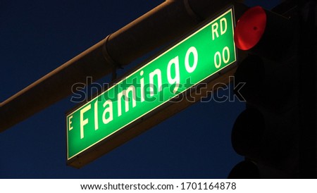 Flamingo Road street sign at Las Vegas Boulevard - evening view - USA 2017
